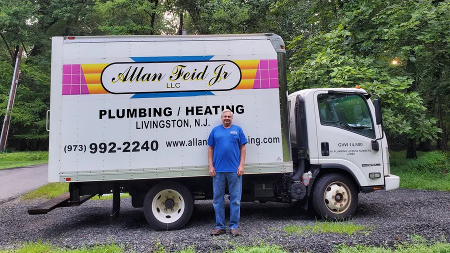 Allan Feid Jr with the Allan Feid Jr, LLC service truck